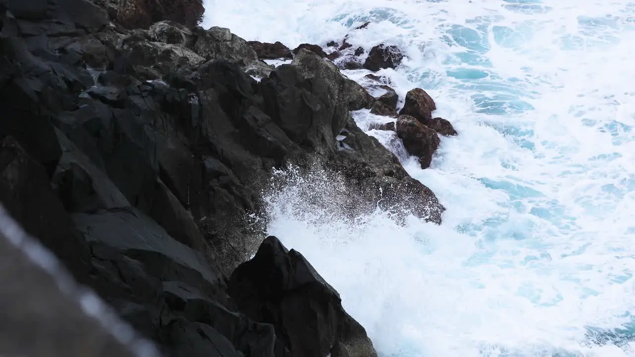 Waves Crashing On Rocky Coastline Of Miradouro da Ponta do Queimado In Azores Terceira Island