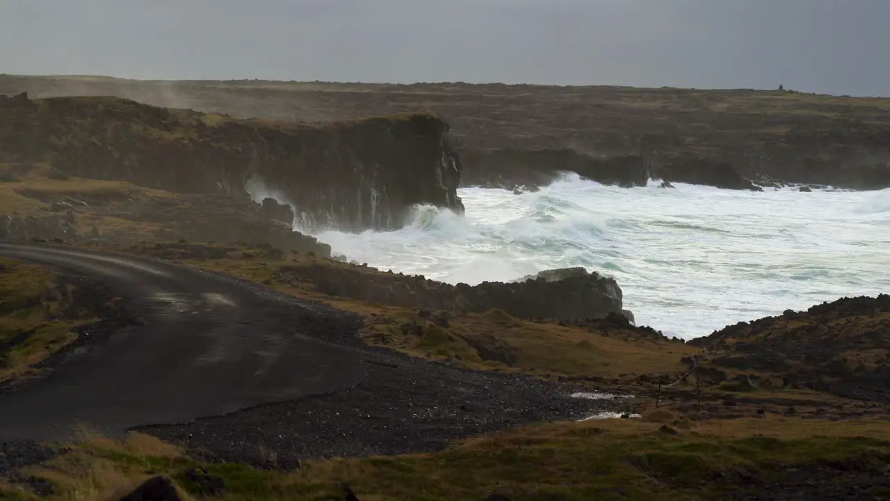 Strong White Waves Crashing On The Rocky Coast In A Stormy Weather