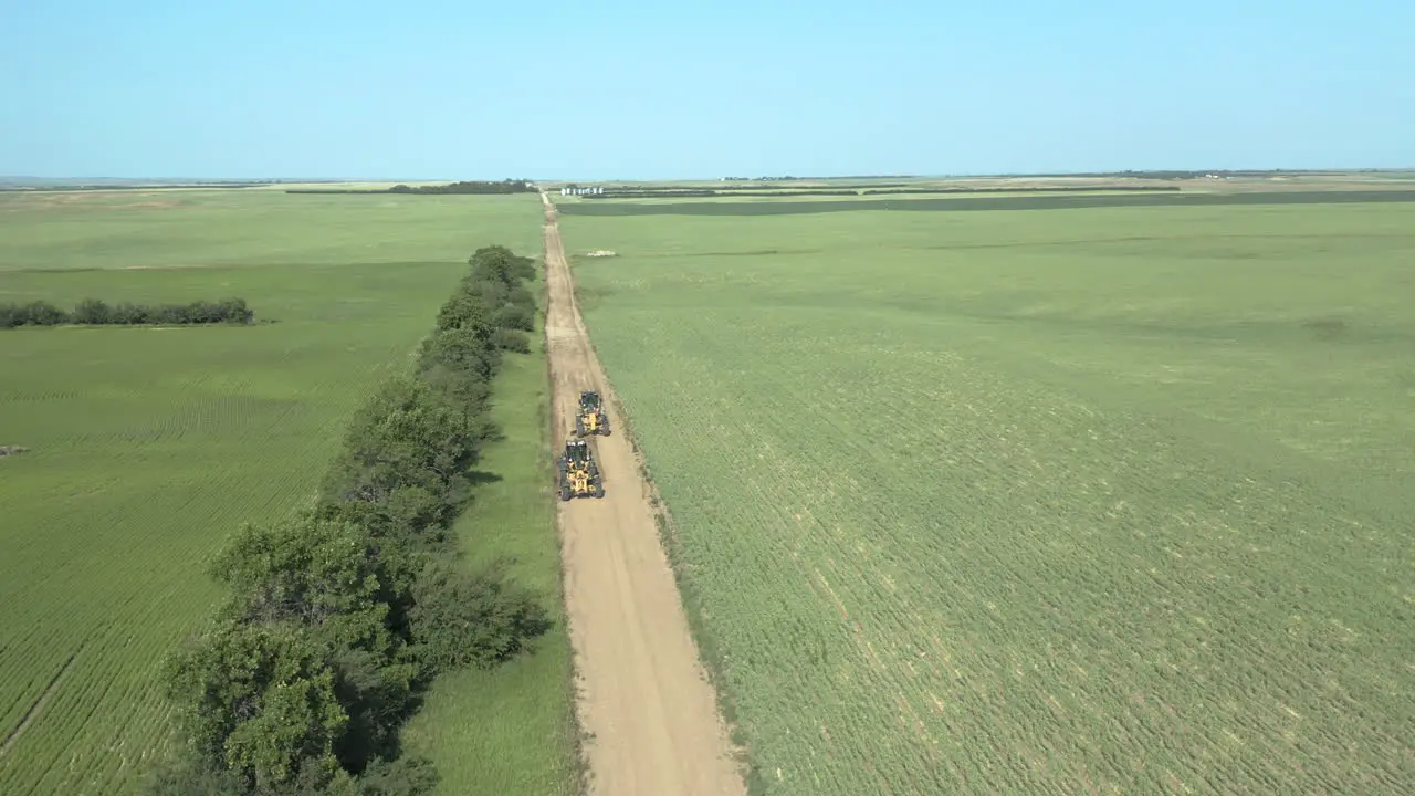 Aerial View Of Road Graders At The Rough Road In Canadian Province Of Saskatchewan