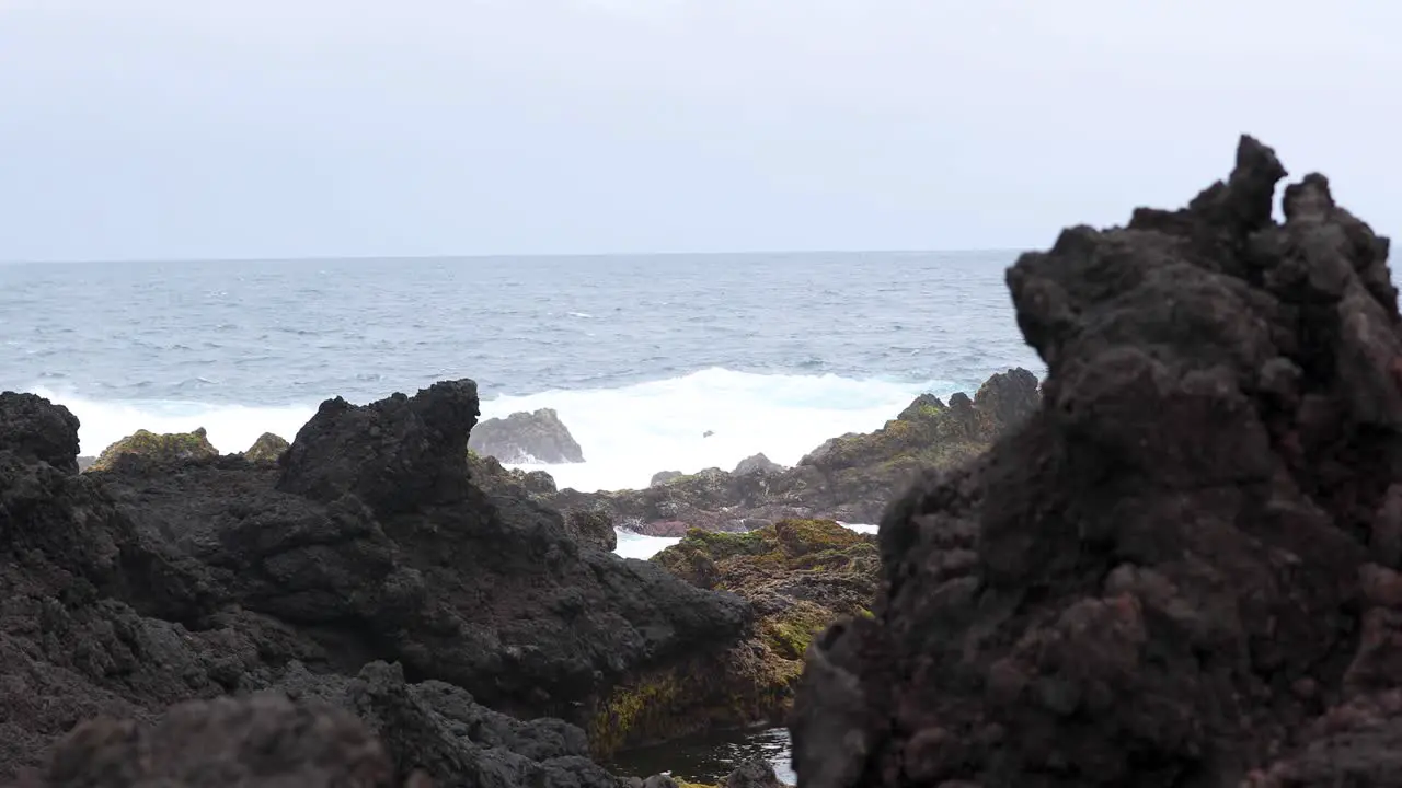 Ocean Waves Crashing On Volcanic Coastline Of Natural Swimming Pools In Terceira Island Azores Portugal