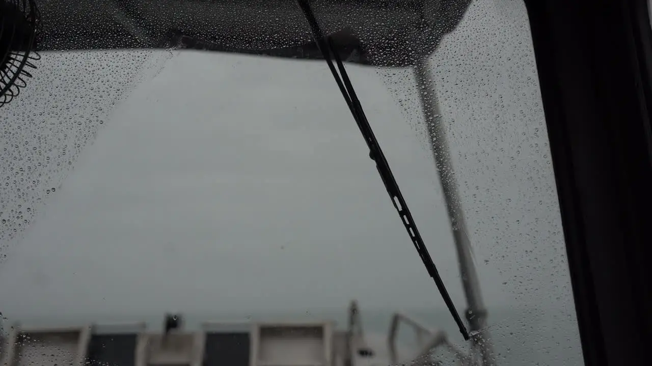 boat navigating through a strong storm