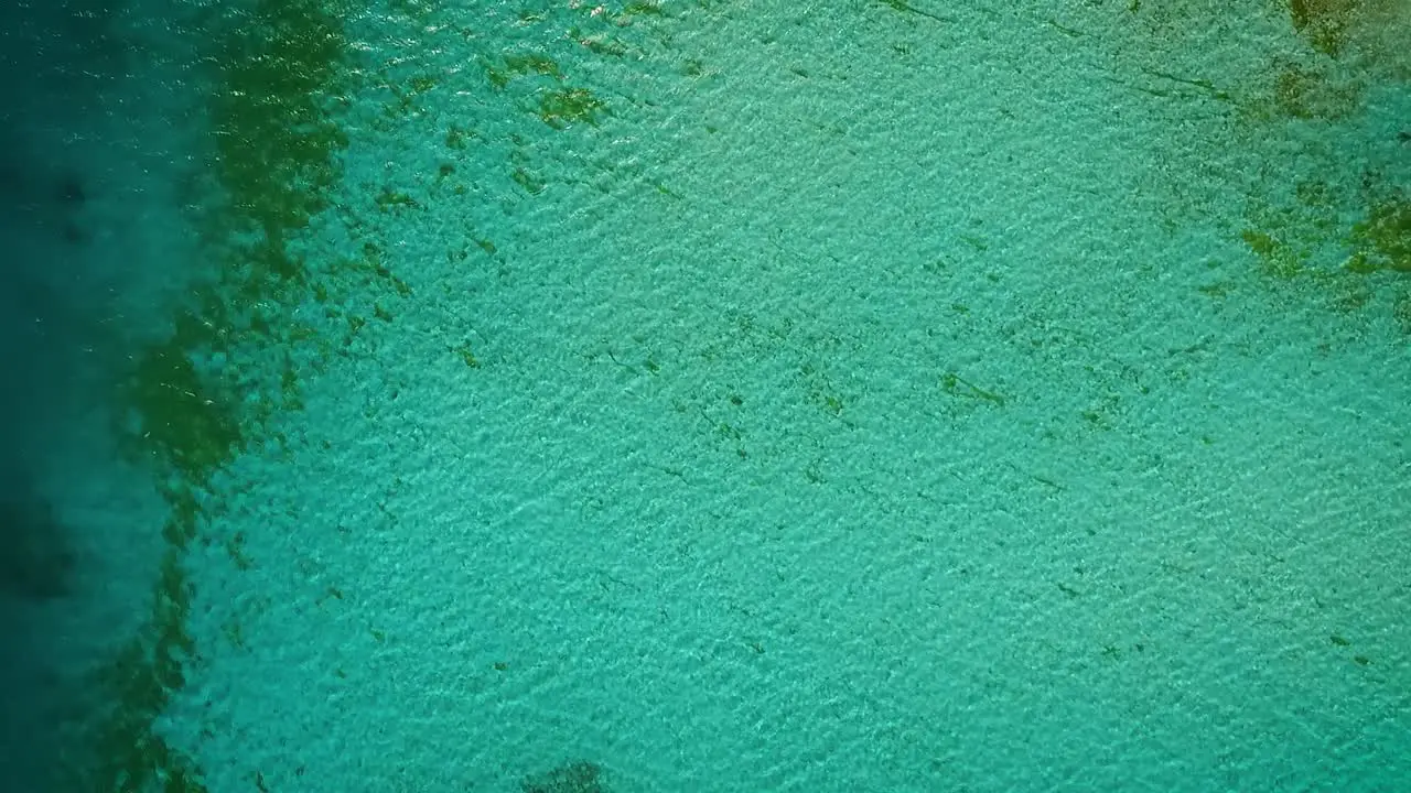 Aerial view of a turquoise Caribbean sea in Los Roques Venezuela