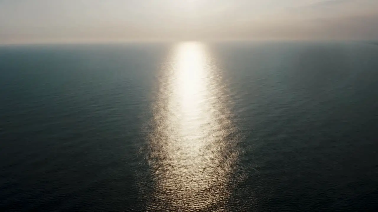 Glistening Water With Sunlight Reflection In Monterrico Beach On Sunrise In Guatemala