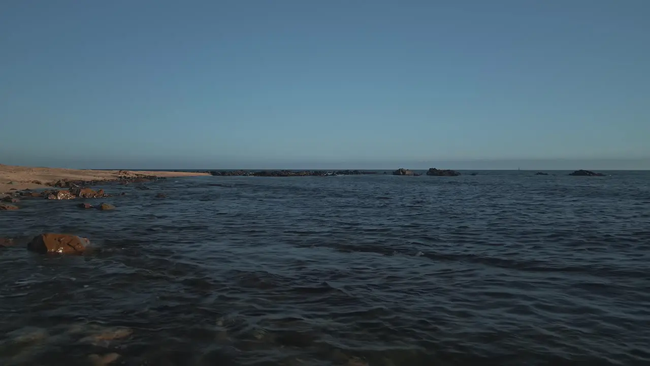 View of empty beach at South of Spain moving backwards and diagonally