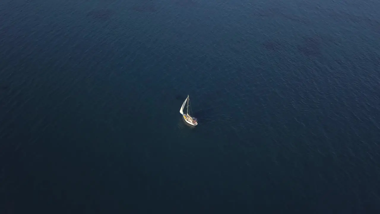 Drone Rising High From Sailing Boat Alone In Deep Blue Sea Cyprus