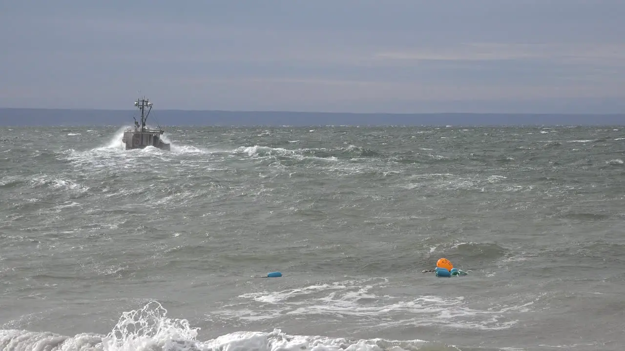 Canada Bay Of Fundy Boat In Stormy Sea Zooms Out