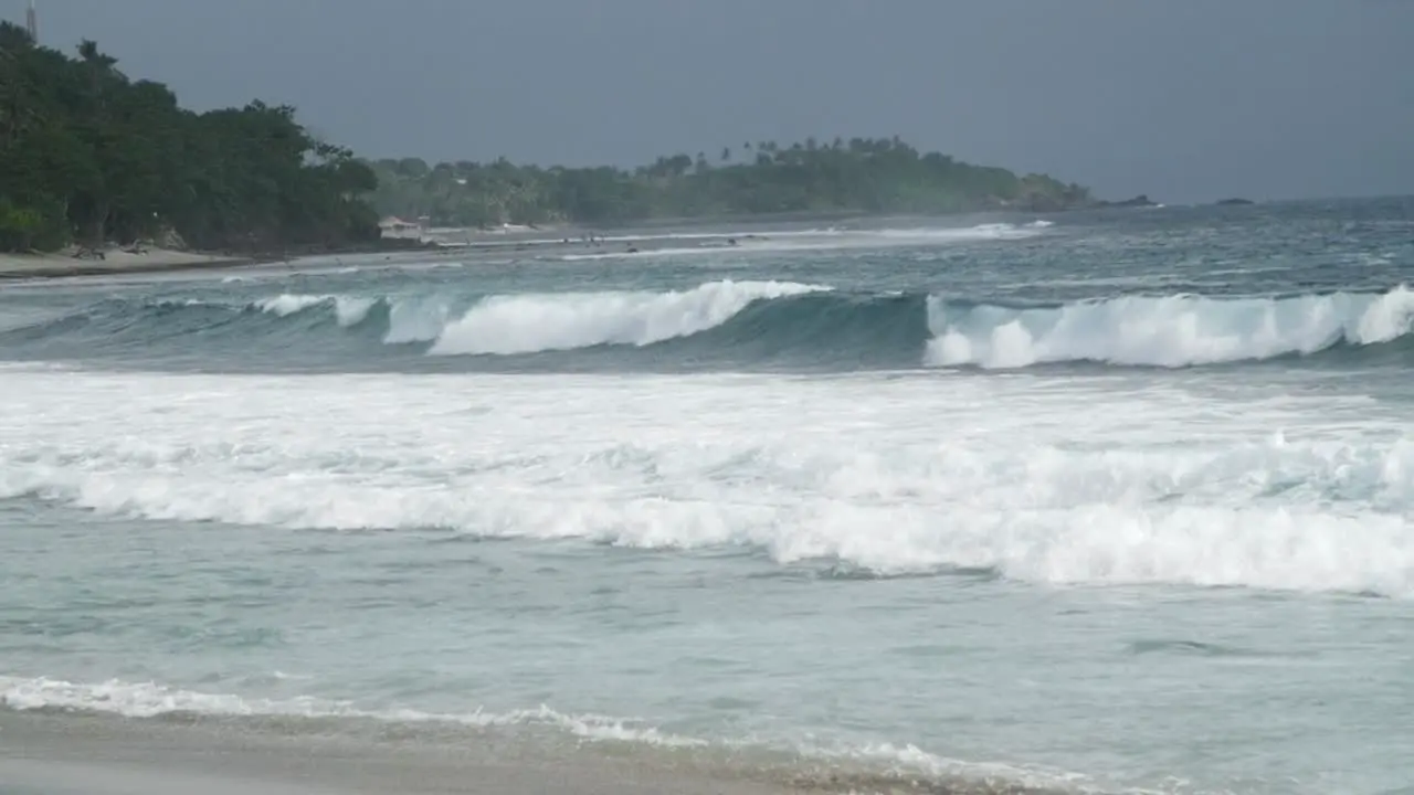 Waves Crashing along Overcast Indonesian Coast