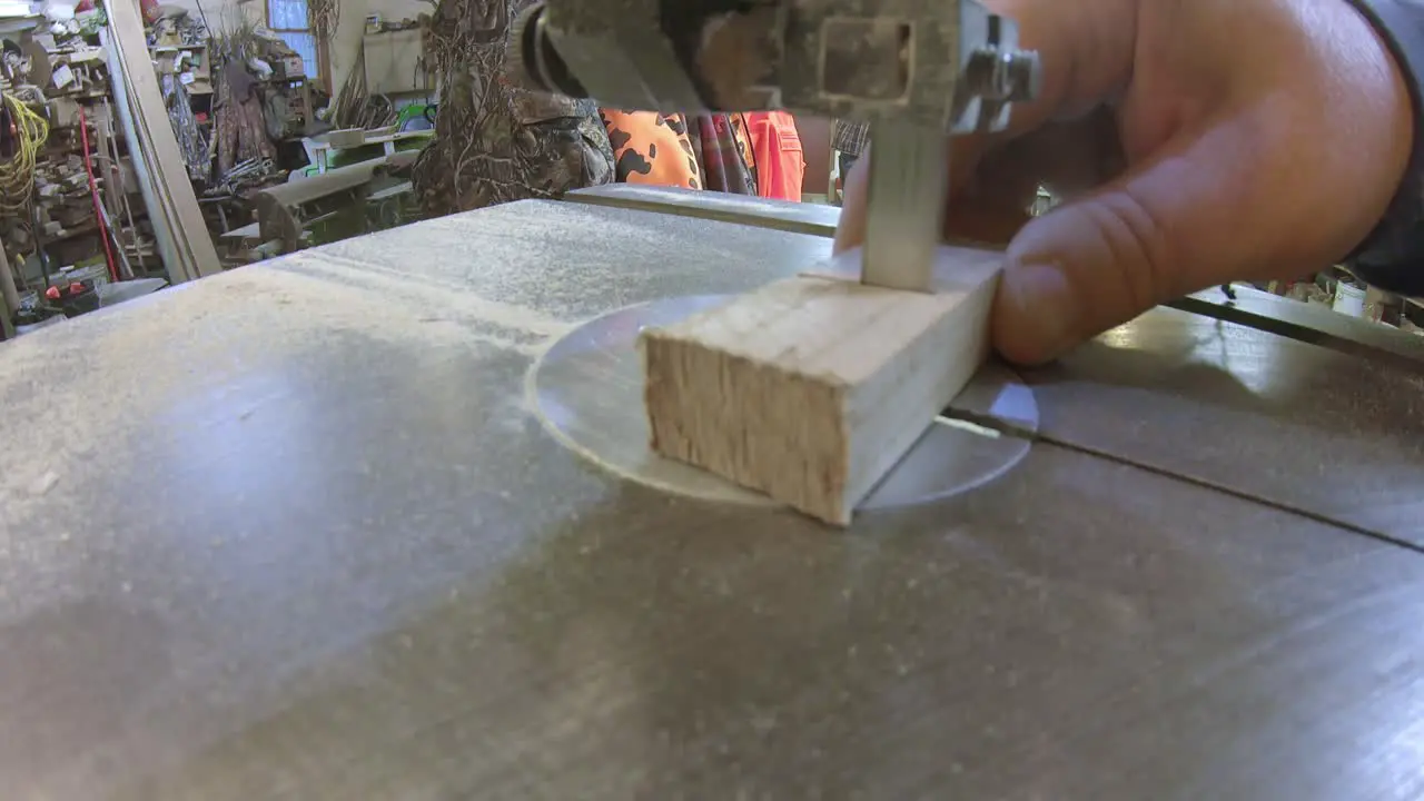 Using a bandsaw to cut a narrow strip of wood