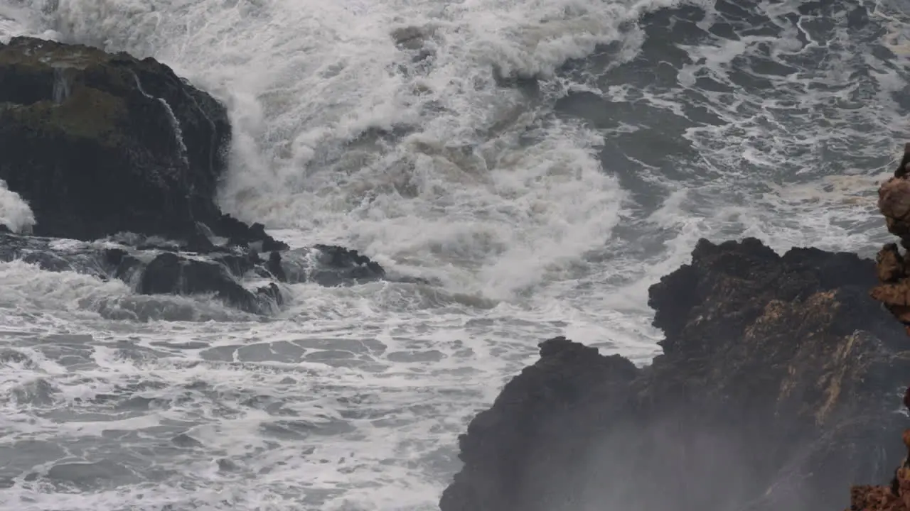 Massive and powerful ocean waves crushing the coast in Nazare Portugal