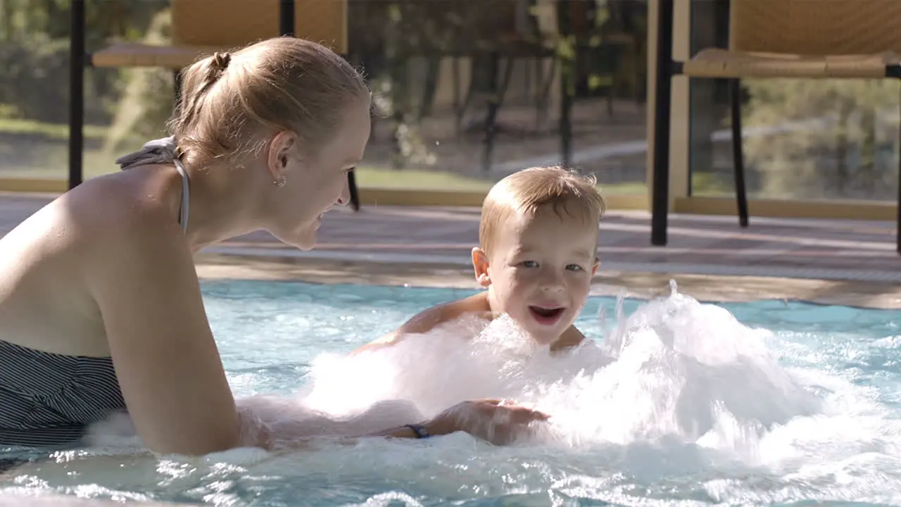 Mother and her son in the swimming pool