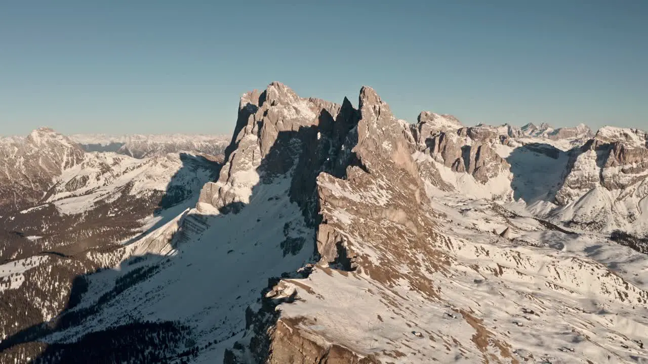 Slow dolly forward drone shot head on with Seceda ridge