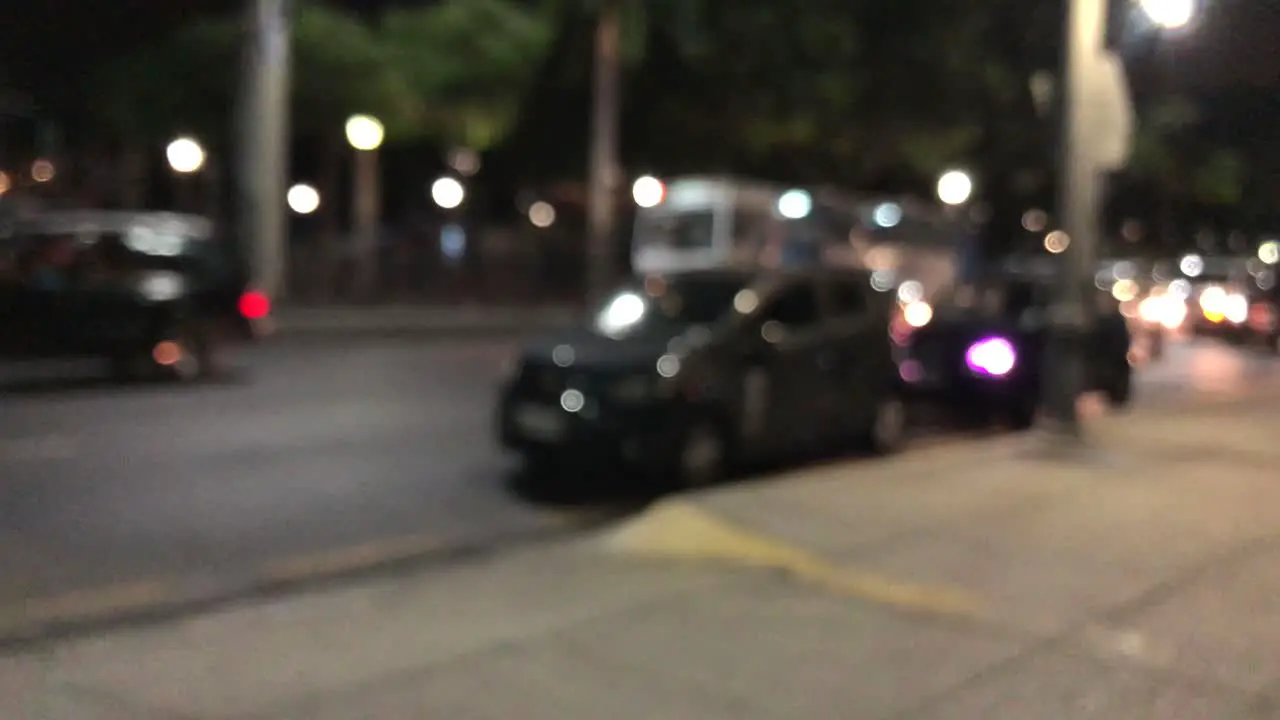 Blurred scene of cars passing by in a low traffic street in Guayaquil Ecuador