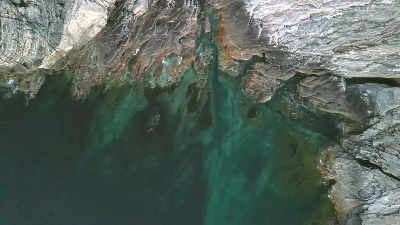 Calm swell against the cliffs