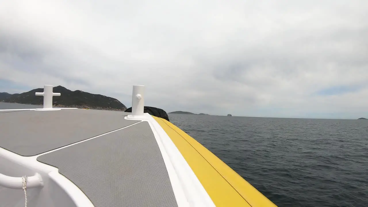 A speedboat sails stably across the sea