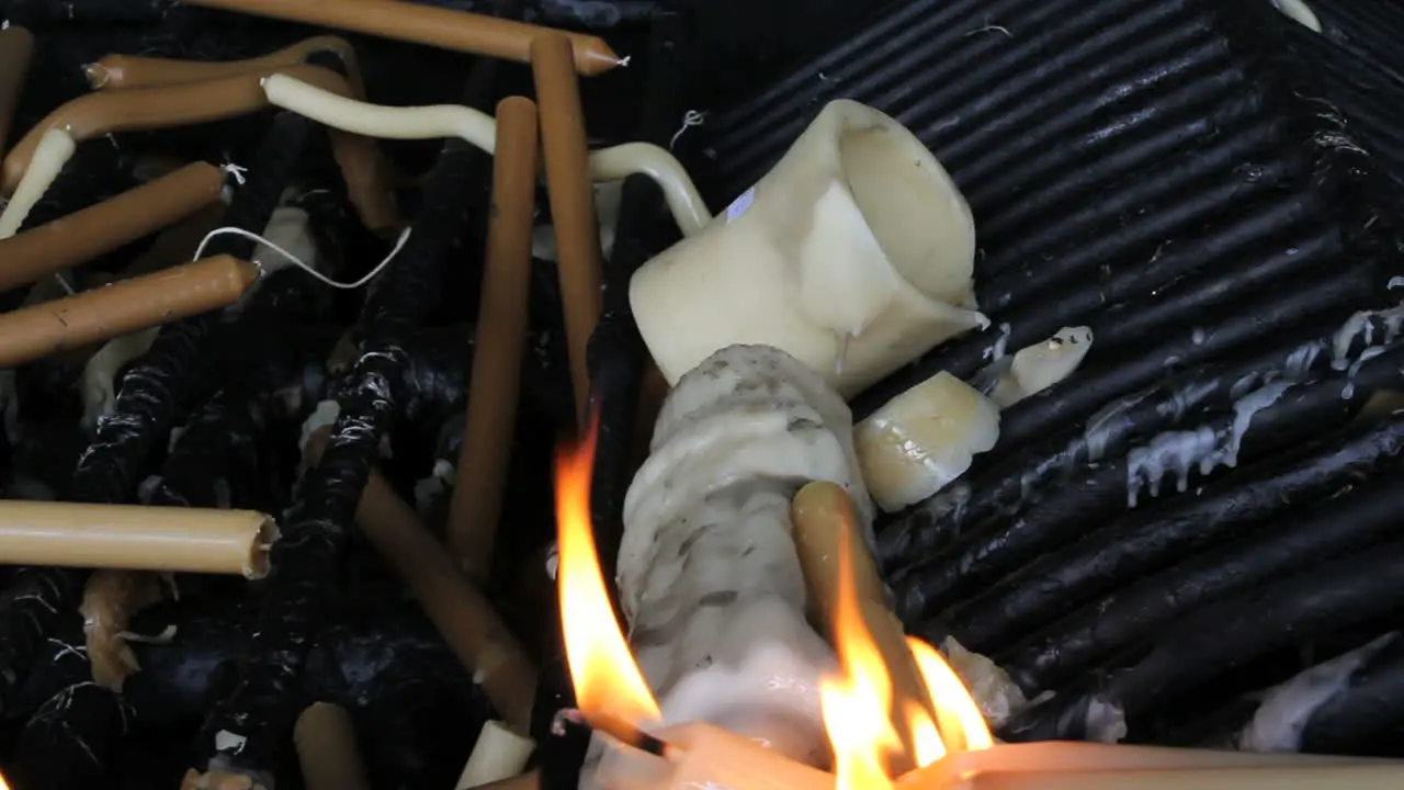 Fatima wax votive offerings and flames