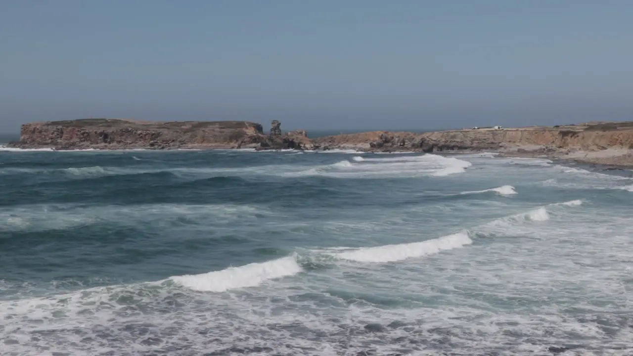 Powerful waves rolling into bay in Portugal