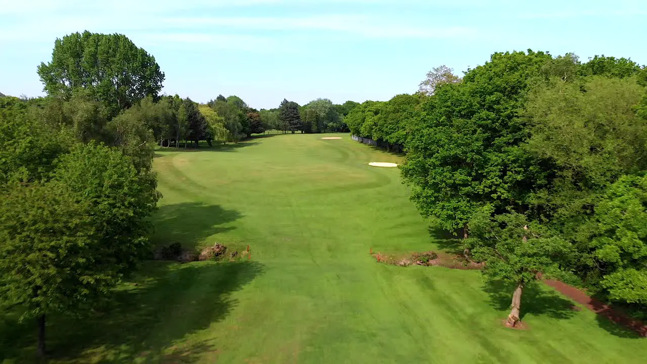 Fast Aerial Flyover of Fairway at British Golf Course