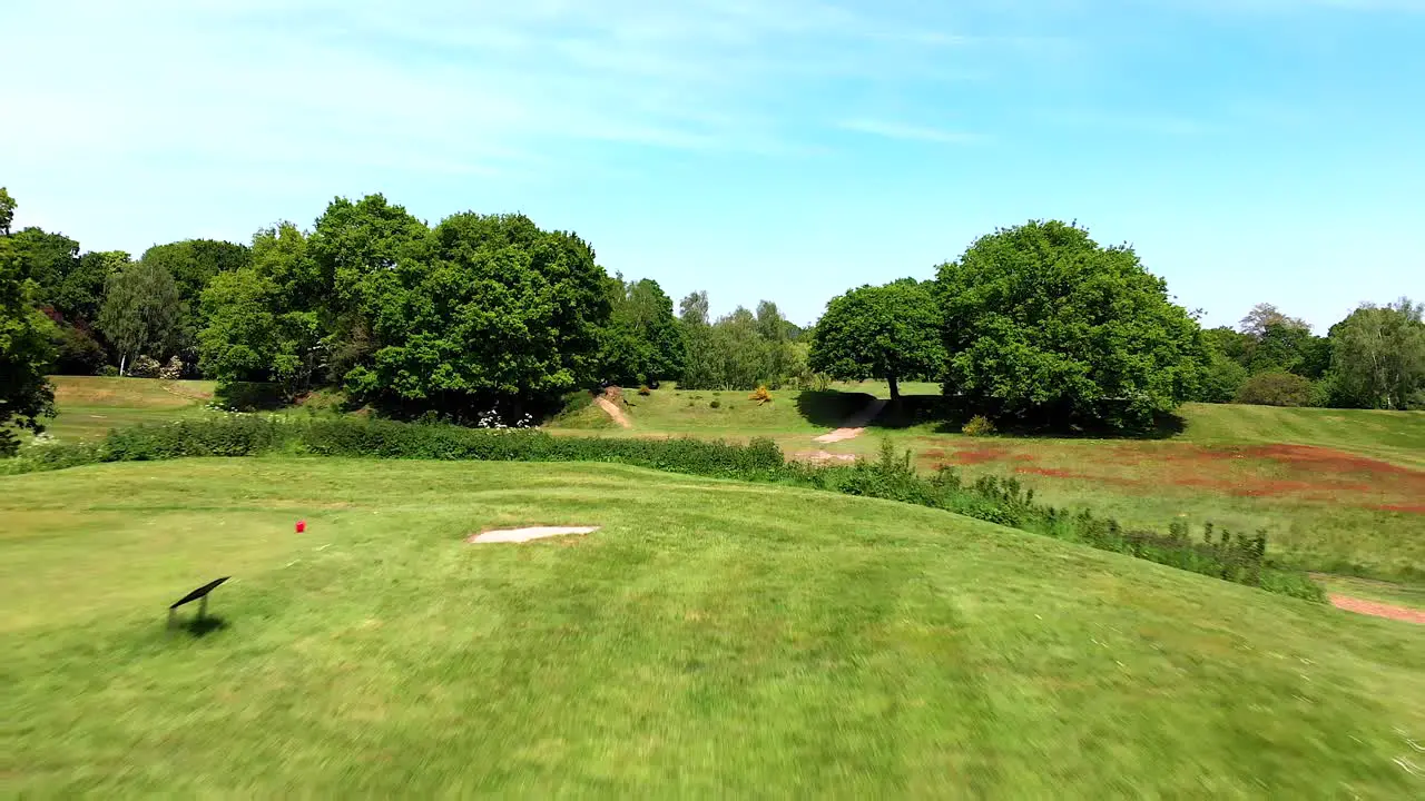 Aerial Golf Flyover with Pro Swinging Ball