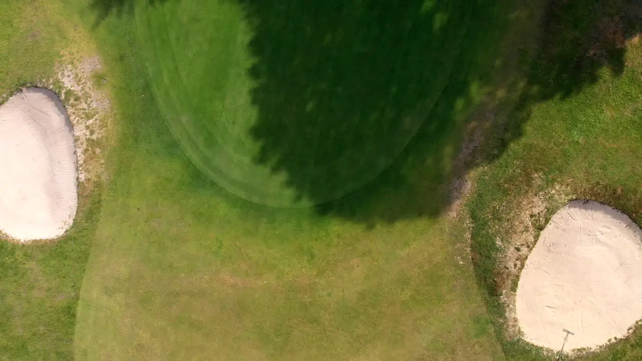 Aerial Crane Reveal of Golf Putting Green and Bunkers