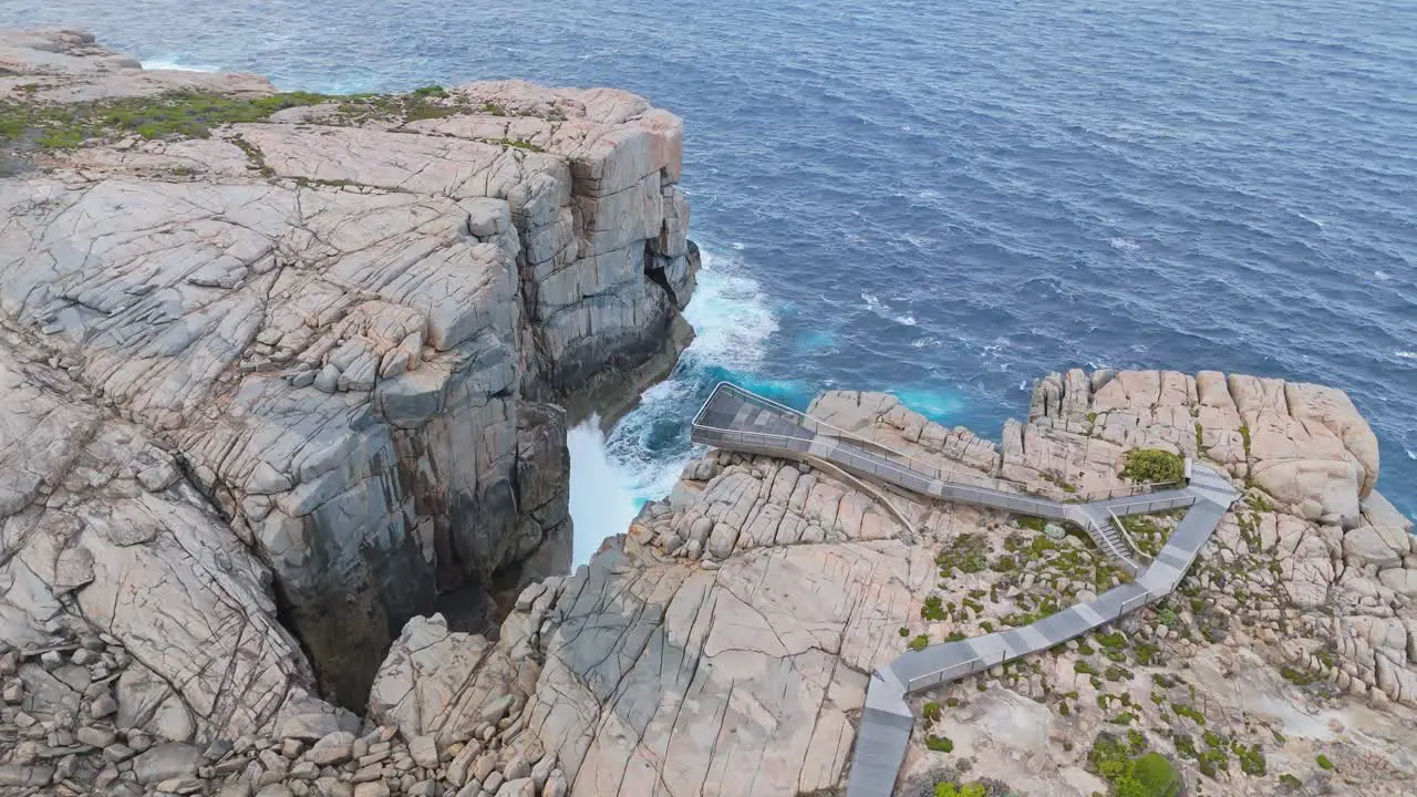 Cinematic flight around The Gap and Natural Bridge in Albany Western Australia