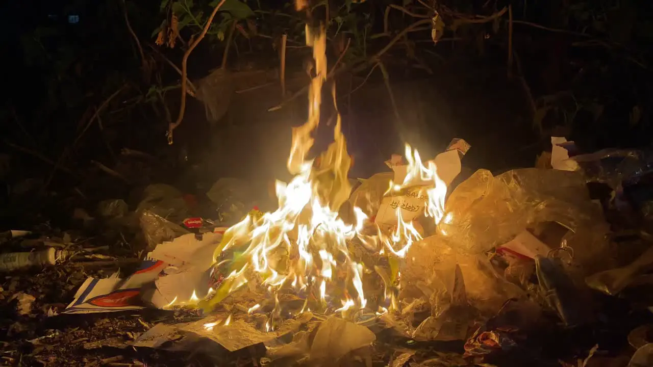 Rubbish Burning With Orange Yellow Flames In Dhaka Street With At Night