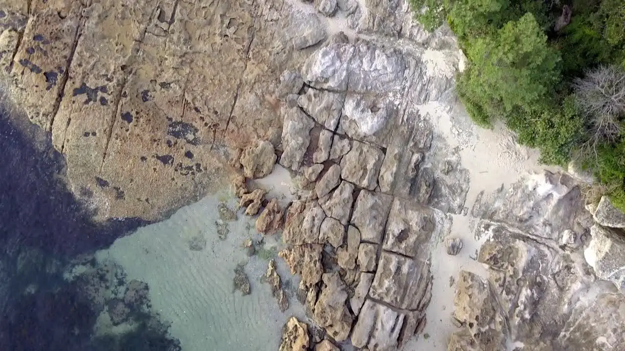 Birdseye looking at a Sandstone formation on the Sydney's Coastal Side