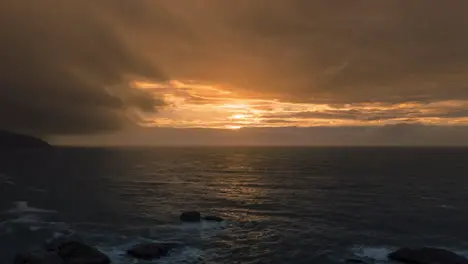 Timelapse sunset and beach waves by night fall