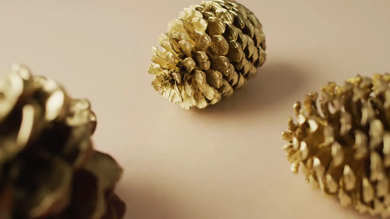 Video of pine cones lying on beige surface