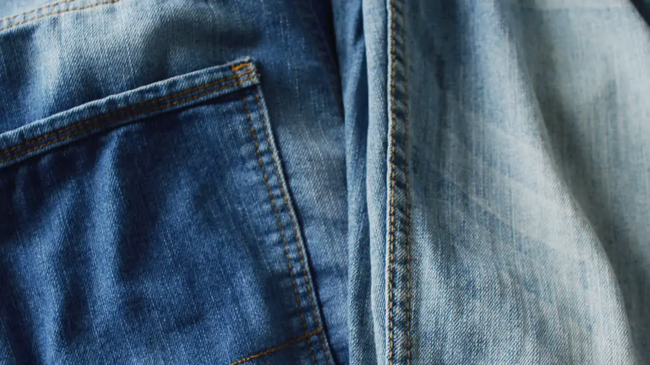 Close up of jeans with different shades with copy space