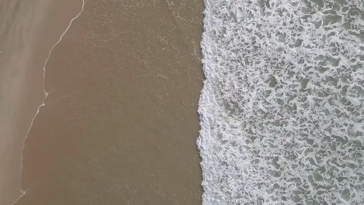 moving over beach crossing the sea and sand