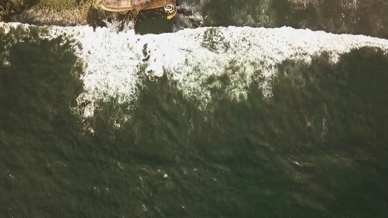 Air view of waves hitting a cliff malecon backdrop in Mazatlan Mexico