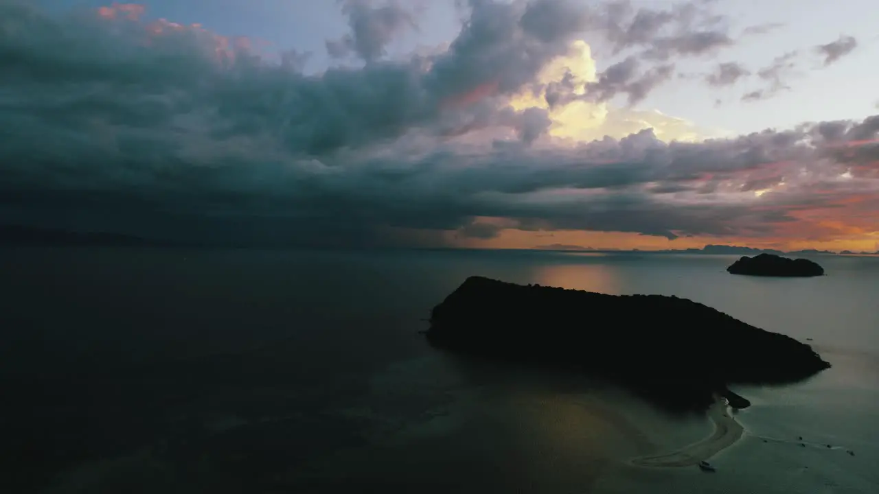 Moving over sea and islands during beautiful sunset