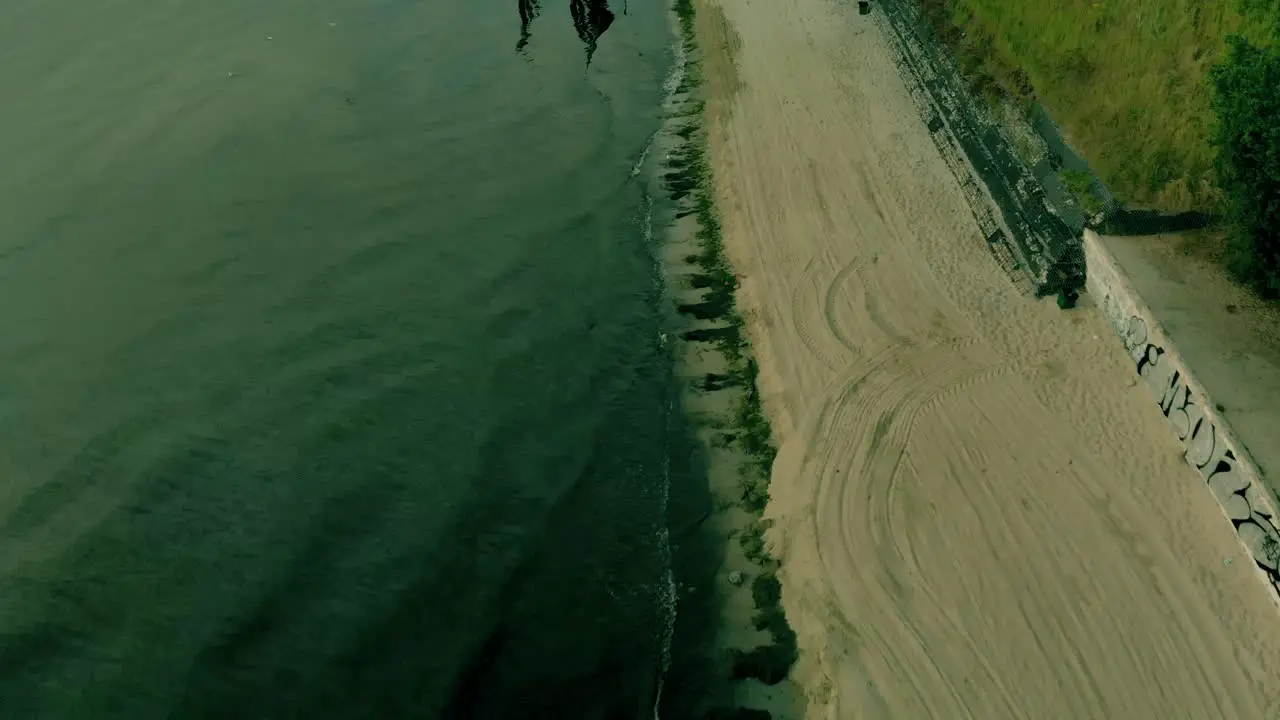 Aerial fotage on empty beach early morning