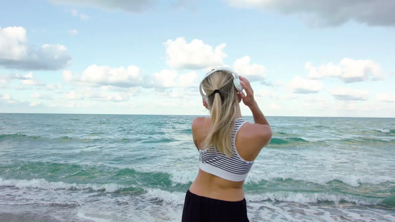 Girl dancing on the beach