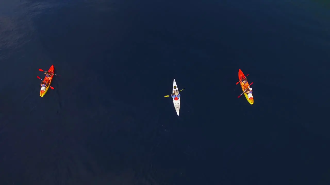 The group has fun in a canoe on the beautiful sea