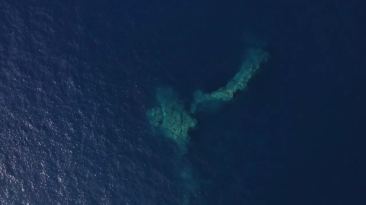 Footage from a drone of a beautiful cliff in the sea