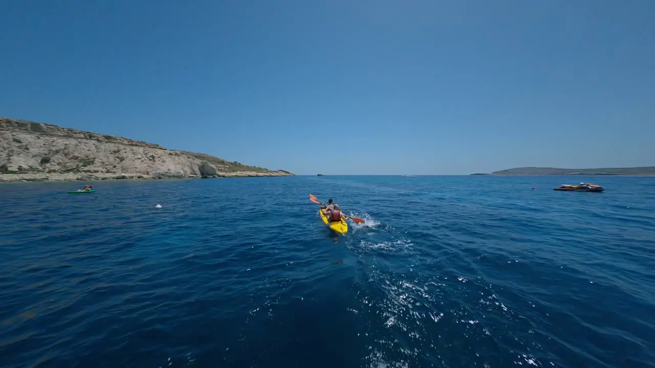 Aerial Of Two People Kayaking In The Sea-1