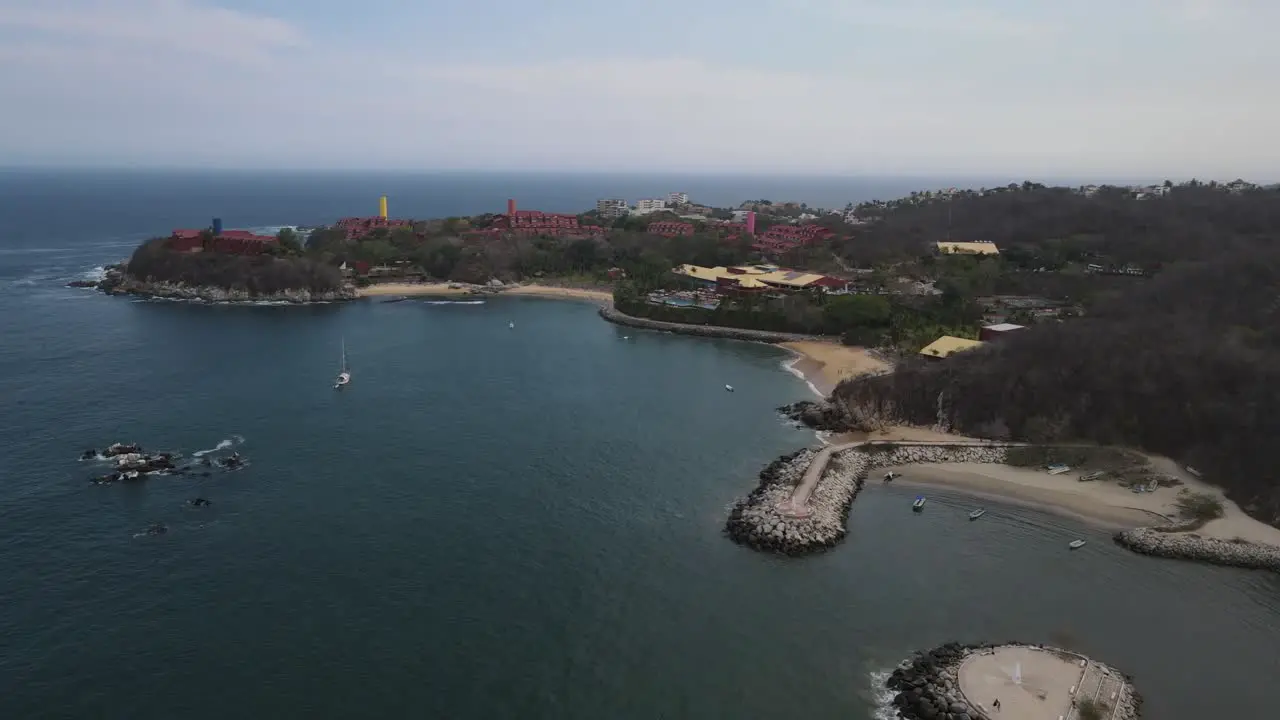 Drone flight over the Huatulco beach in a summer day