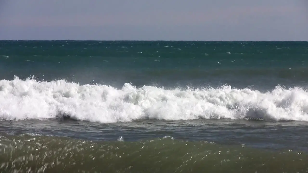 Surfer falling in El Saler beach Spain