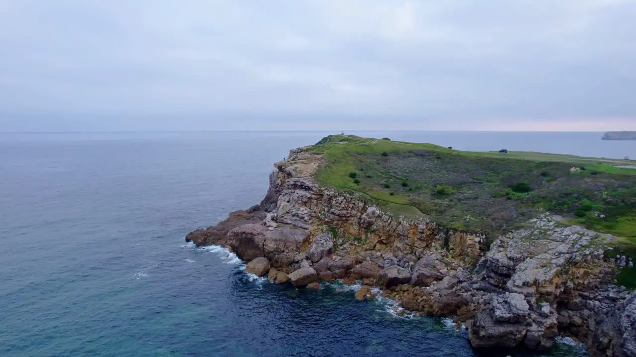 drone clip by the cliff next to the ocean