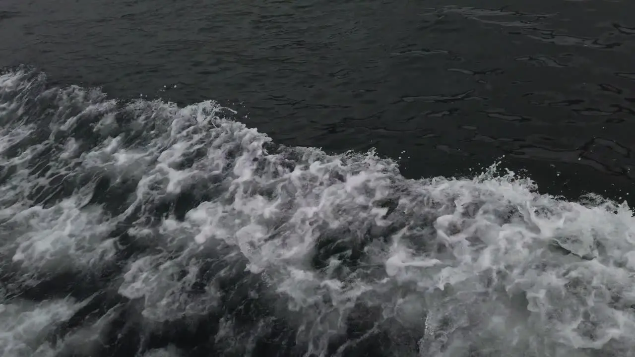 Ferry Wake On Side Of Boat While Traveling On The Ocean