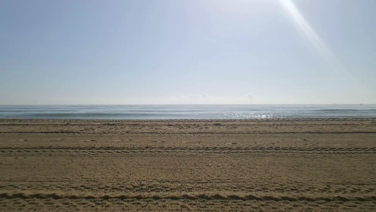 Horizontal shot of empty beach on a clear sunny day