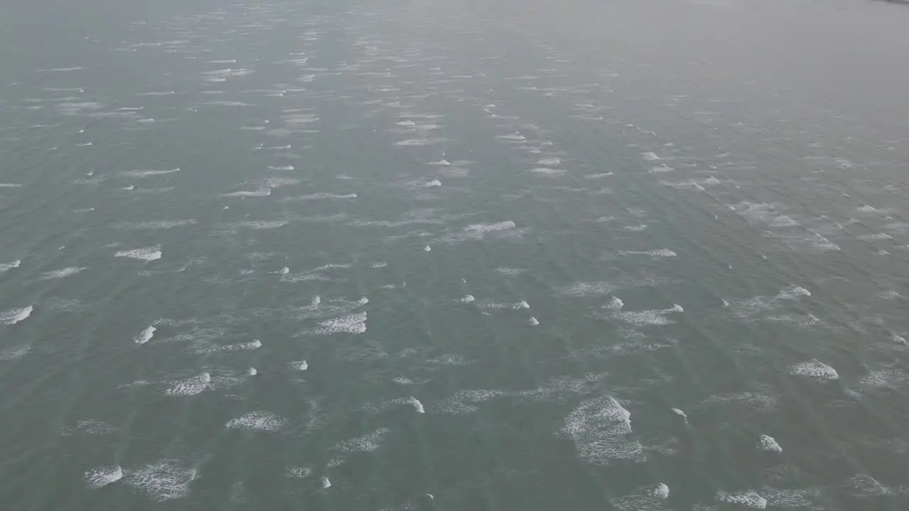 Coral Sea In Hervey Bay With Small Waves Running On The Surface