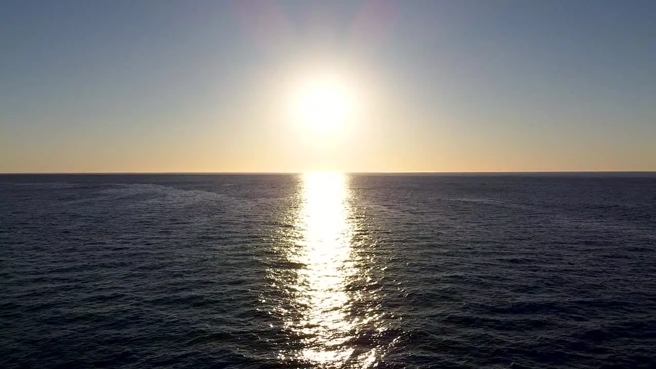 Sun reflects off the ocean at sunset