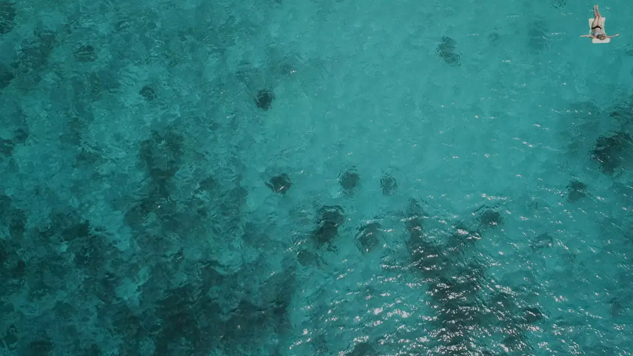 High altitude drone shot at the caribbean sea on the Kenepa beach in Curacao