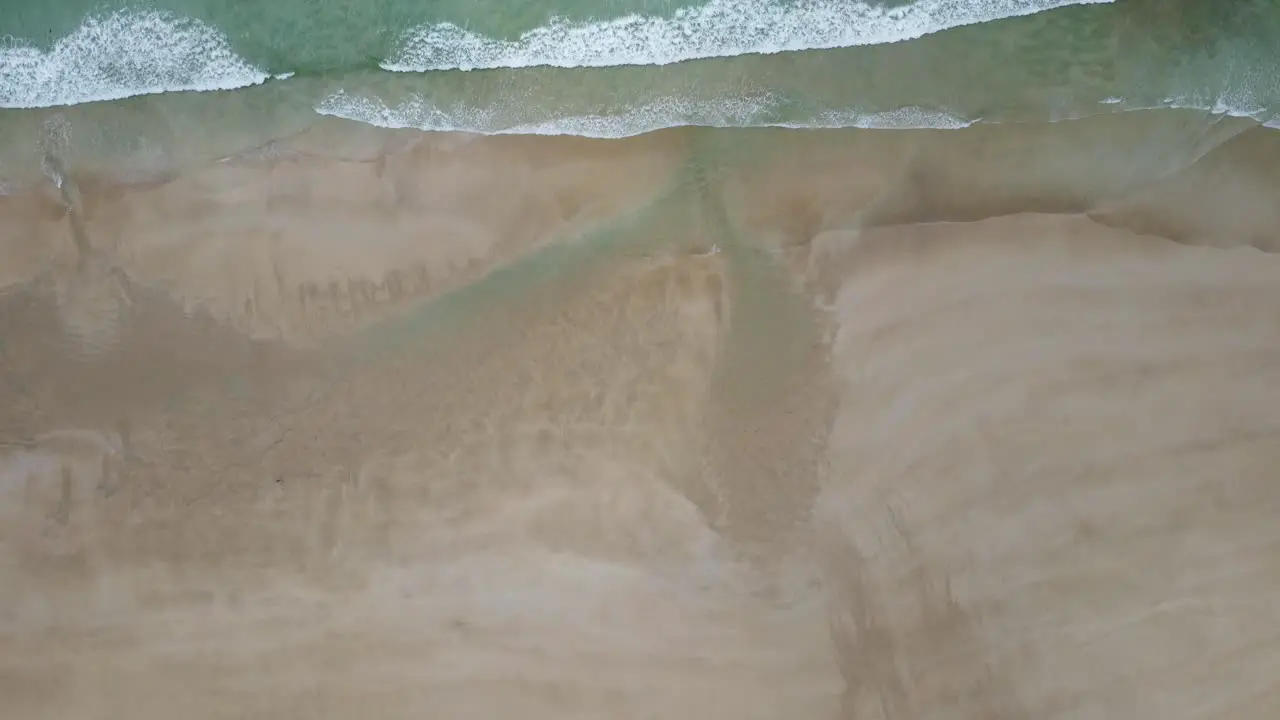 Drone films the beautiful waves of pen hat beach in brittany france from above