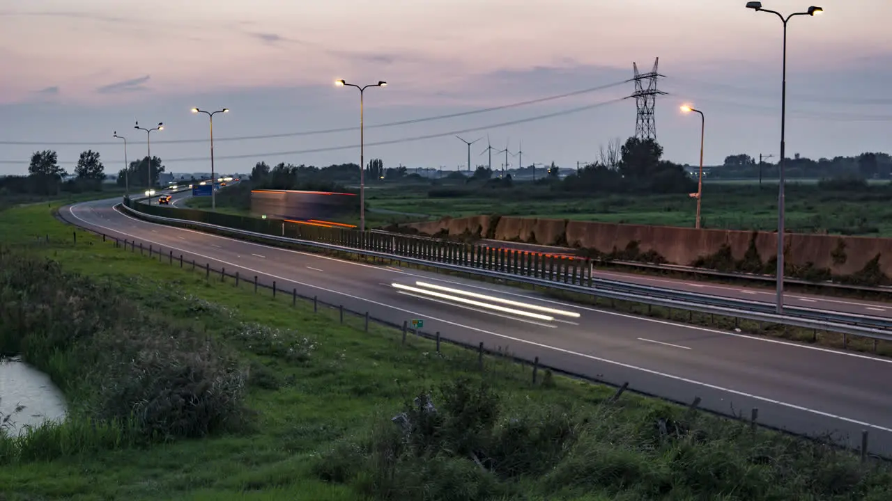 Timelapse of a highway during a day to night transition