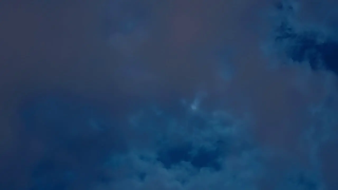 Timelapse of clouds in the night sky