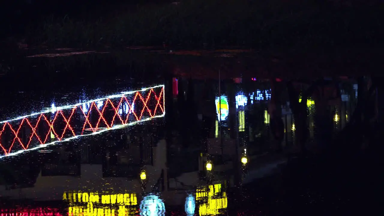 Reflection of the Illuminated Bridge in the Water