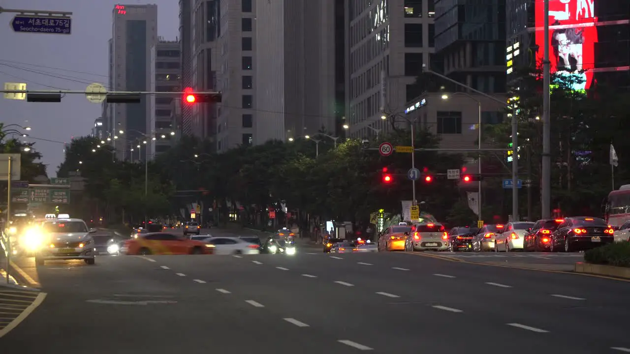 Many cars at Gangnam station multilane crossroads stoped on red signaling light Seoul South Korea